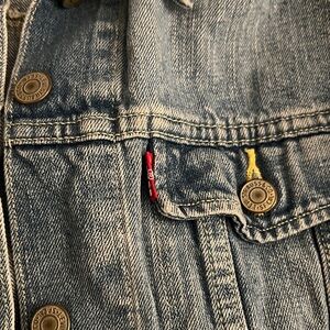 Levi's Classic Blue Jeans with Red and Yellow Accents